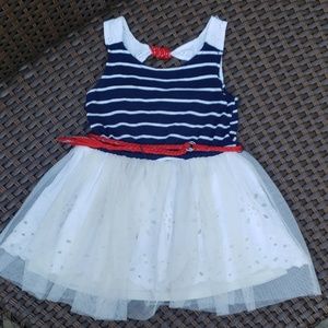 Navy and white striped tulle dress with red belt